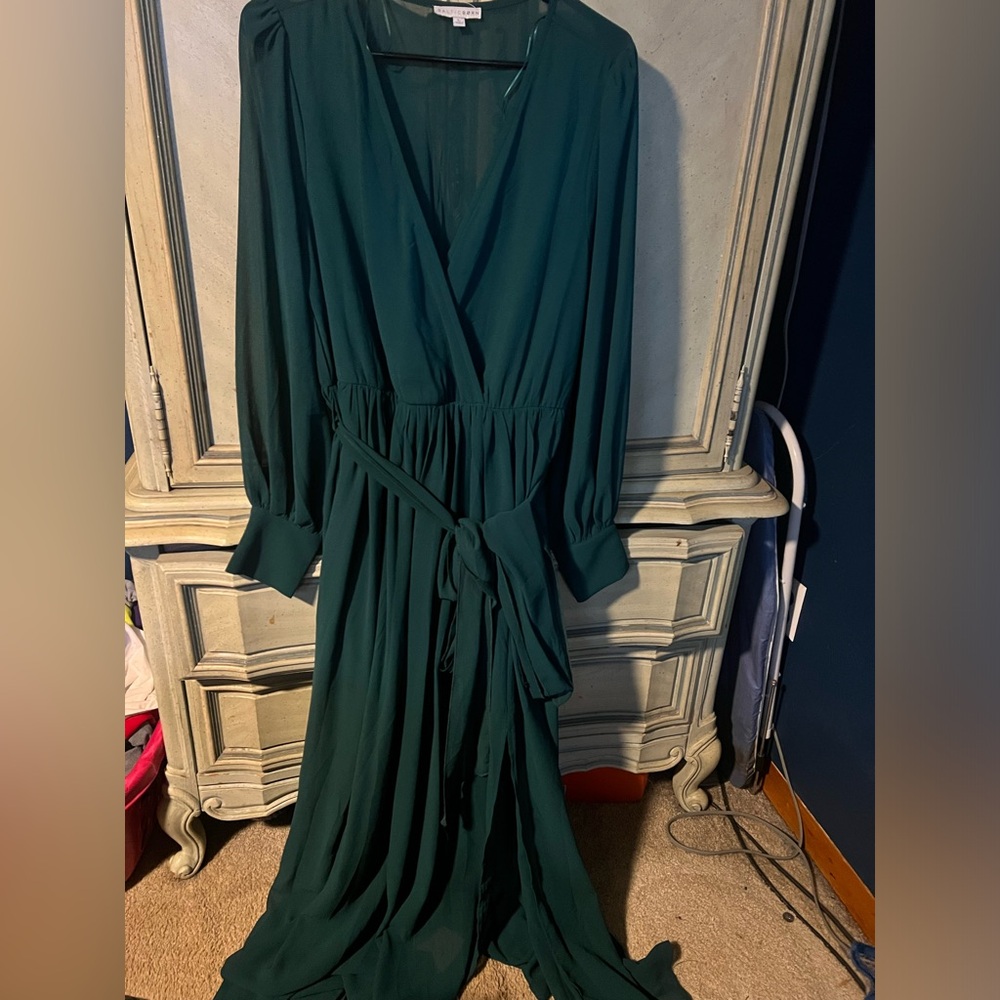 Sheer polyester long sleeve green holiday gown with slit